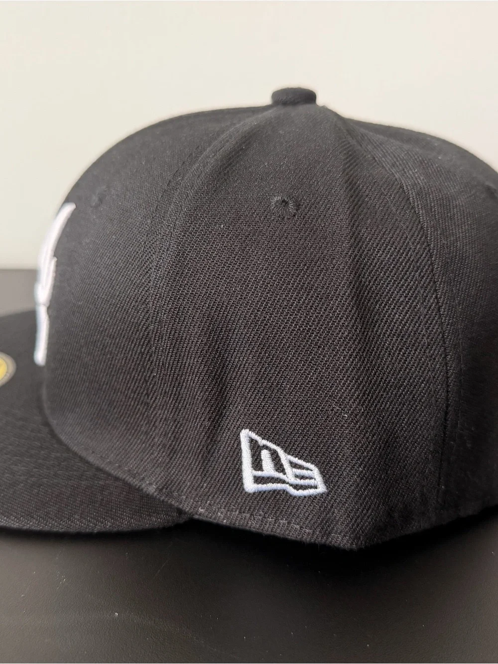 New Era Black Cap with White Script and Green Street Sign Patch